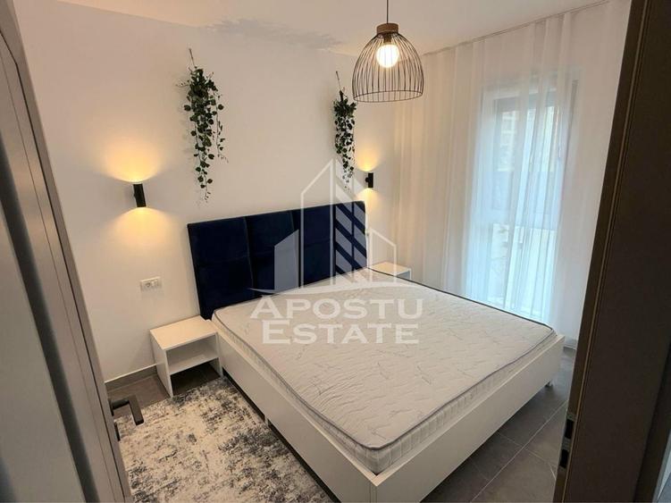 Apartament cu 2 camere semidecomandat, mobilat în UTA