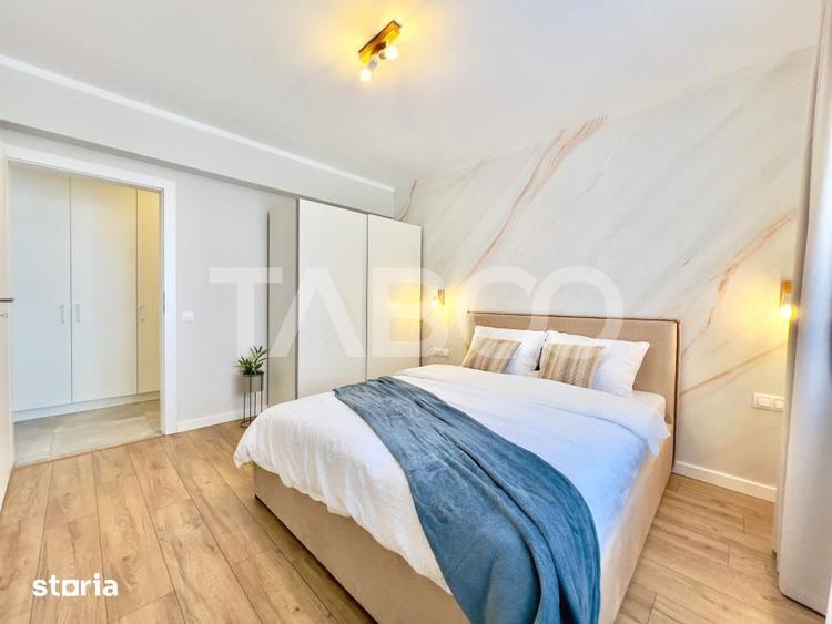 Apartament spatios - intabulat - mobilat si utilat - parcare privata - 14