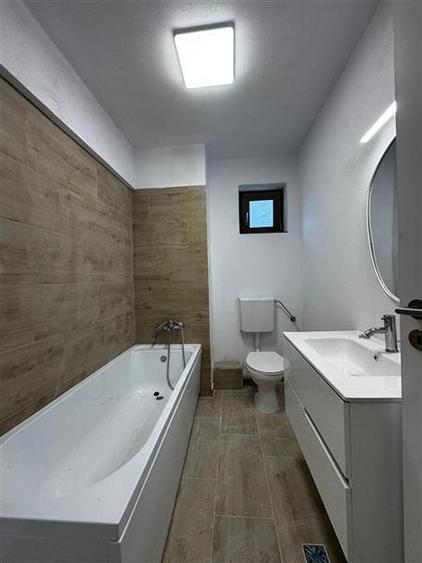 Apartament cu 3 camere semidecomandat, mobilat în Borhanci