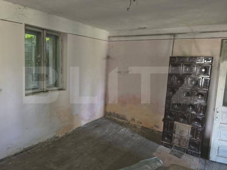 Casă cu 2 camere cu Teren 1200 Mp în Nord