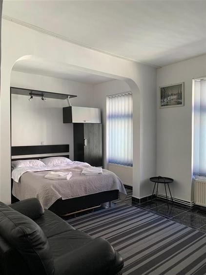 Apartament cu 2 camere semidecomandat, mobilat în Centrul Istoric