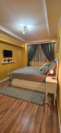 Apartament cu 2 camere, mobilat în Central