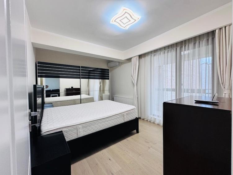 Apartament cu 3 camere semidecomandat, mobilat în Banu Manta