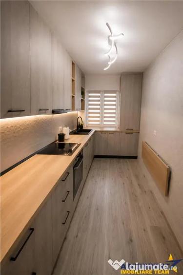 Apartament cu 2 camere decomandat în Tractorul