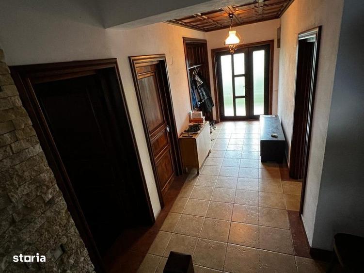 Casă cu 4 camere cu Teren 1741 Mp în Buriaș