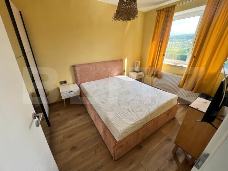 Apartament cu 2 camere semidecomandat, mobilat în Chinteni