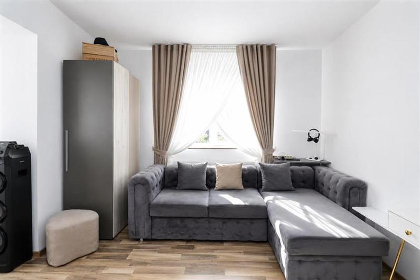 Apartament cu 2 camere decomandat în Tractorul