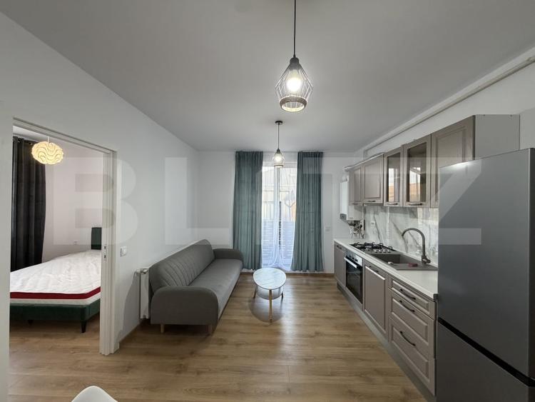 Apartament cu 3 camere semidecomandat, mobilat în Chinteni