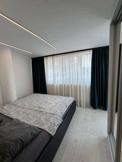 Apartament cu 2 camere semidecomandat, mobilat în Romană