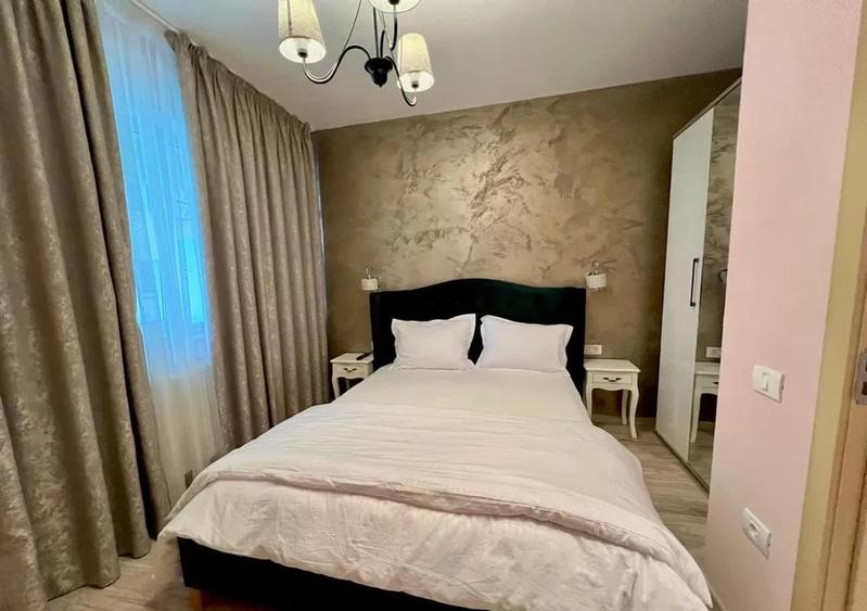 Apartament cu 2 camere semidecomandat, mobilat în Central