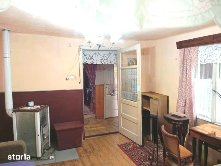 Casă cu 4 camere cu Teren 1200 Mp în Buteni