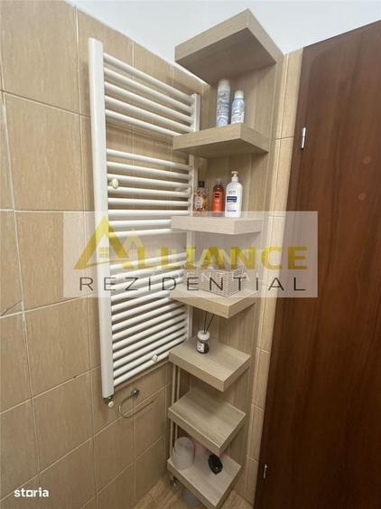 Garsonieră decomandată în Titan