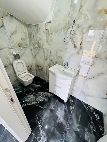 Casă individuală cu 4 camere cu Canalizare în Tunari