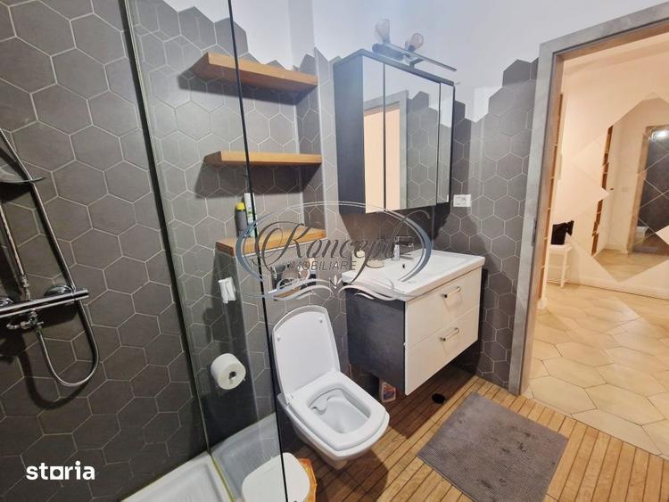Apartament cu 2 camere semidecomandat, mobilat în Borhanci