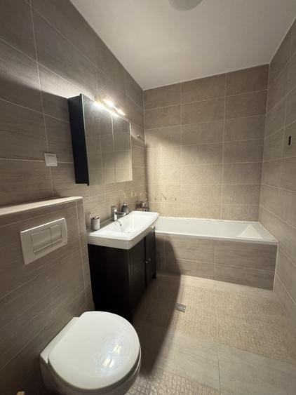 Apartament cu 2 camere semidecomandat, mobilat în Florești