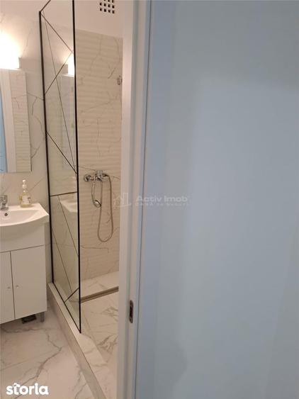 Apartament cu 3 camere semidecomandat, mobilat în Rahova