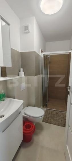 Apartament cu 2 camere semidecomandat, mobilat în Calea Moldovei
