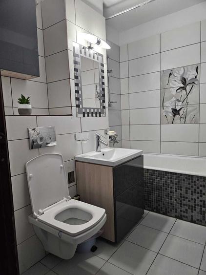 Apartament cu 2 camere semidecomandat, mobilat în Girocului