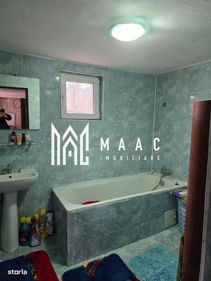 Casă cu 4 camere în Drăganu