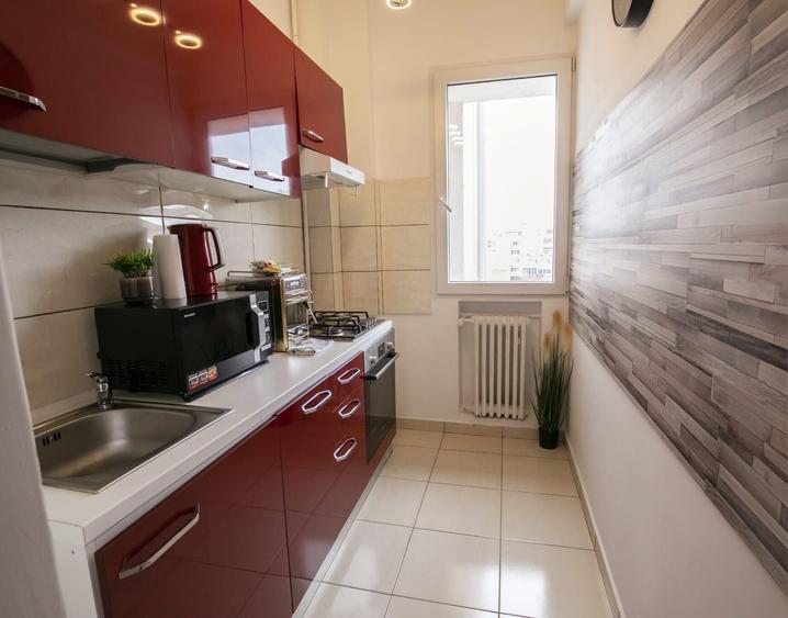 Apartament cu 2 camere semidecomandat, mobilat în Universitate