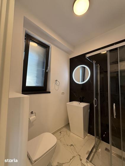 Casă cu 4 camere cu Teren 100 Mp în Central