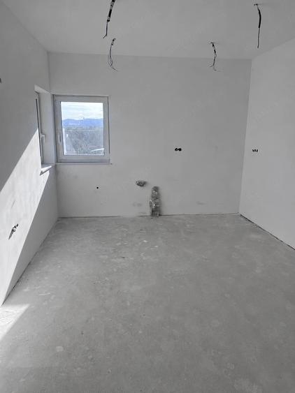Casă cu Teren 600 Mp în Central