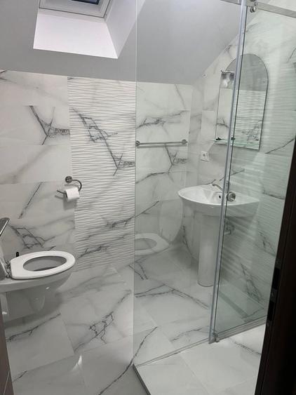Casă cu 4 camere cu Teren 1000 Mp în Central