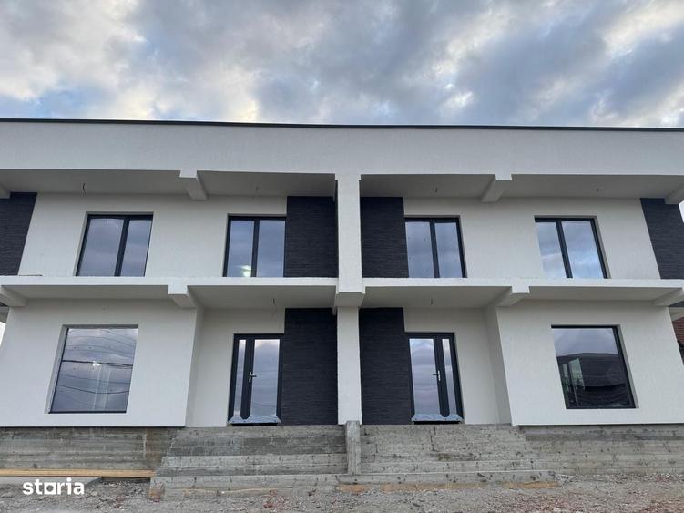 Casă cu 4 camere în Bascov