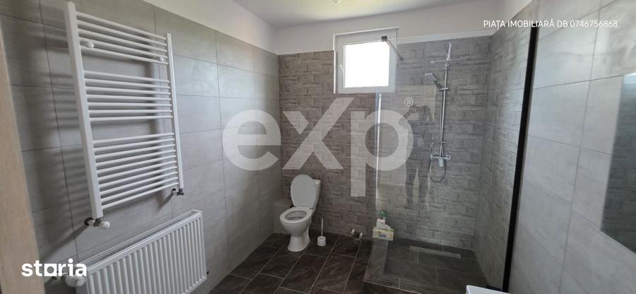 Casă cu 8 camere cu Teren 1388 Mp în Voinești