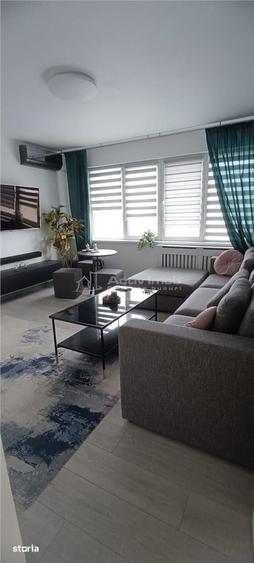 Apartament cu 3 camere semidecomandat, mobilat în 1 Mai