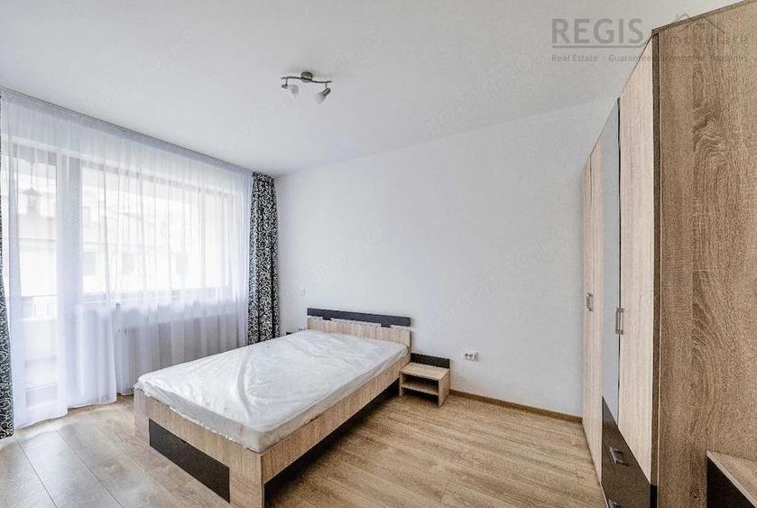 Apartament cu 2 camere decomandat în Tractorul