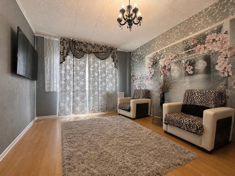 Apartament cu 4 camere decomandat în Confecții