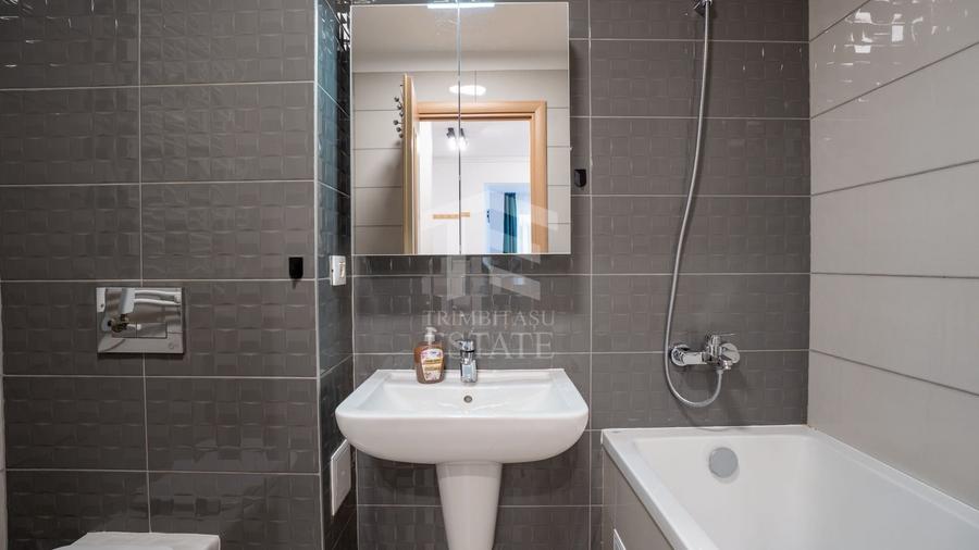 Apartament cu 2 camere semidecomandat, mobilat în Tractorul