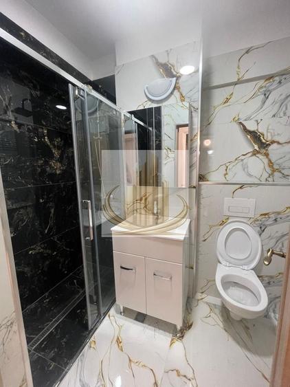 Apartament cu 3 camere, mobilat în Central