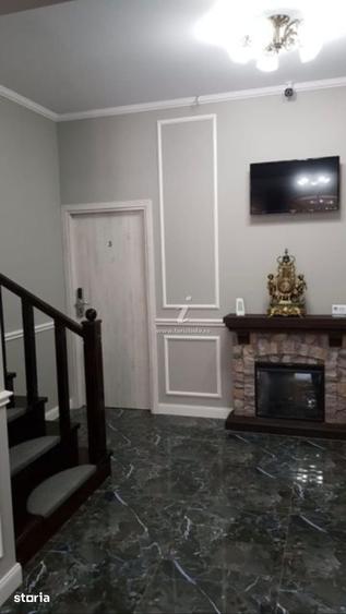 Casă cu Teren 900 Mp în Central