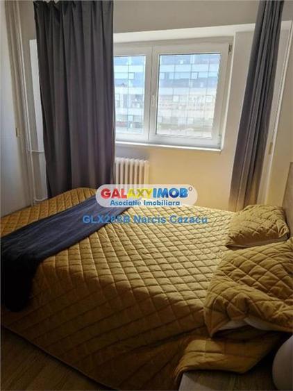 Apartament cu 2 camere semidecomandat, mobilat în P-ța Victoriei