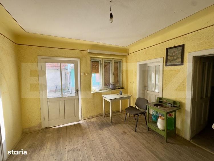Casă cu 4 camere cu Teren 1220 Mp în Cut