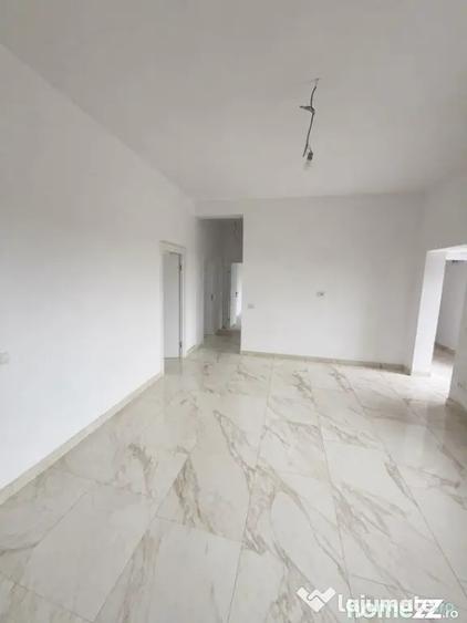 Casă cu 4 camere cu Teren 398 Mp în Cumpăna