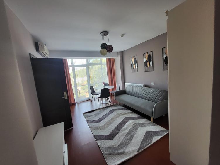 Apartament cu 2 camere semidecomandat, mobilat în Bucium