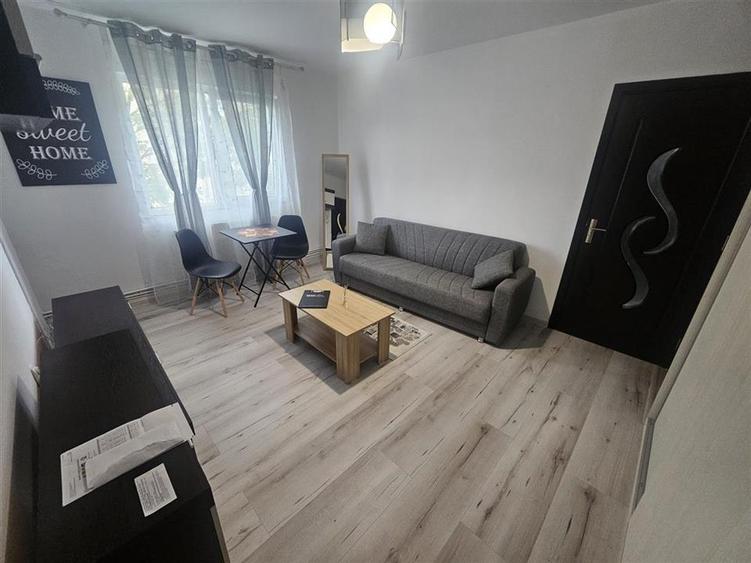 Apartament cu 2 camere semidecomandat, mobilat în Florilor