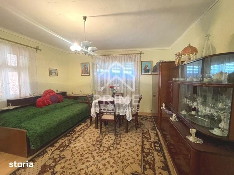 Casă cu 4 camere cu Teren 1400 Mp în Dos