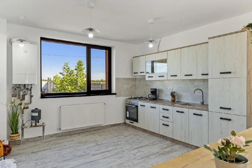 Casă cu Teren 1280 Mp în Ciorogârla