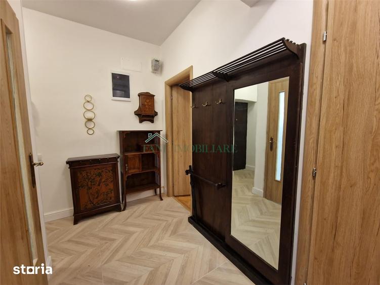Apartament cu 4 camere în Romană