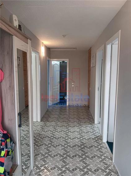 Casă cu Teren 1200 Mp în Filiași