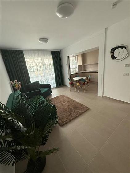 Apartament cu 2 camere decomandat, mobilat în Tractorul
