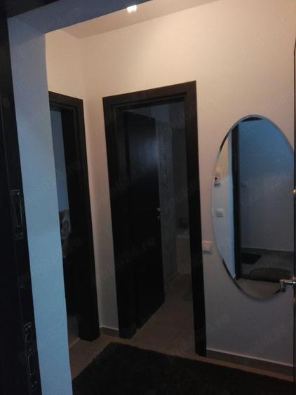 Garsonieră decomandată în Titan