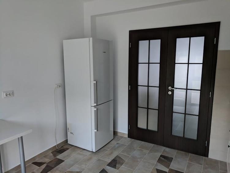 Duplex cu 4 camere cu Teren 150 Mp în Bucium