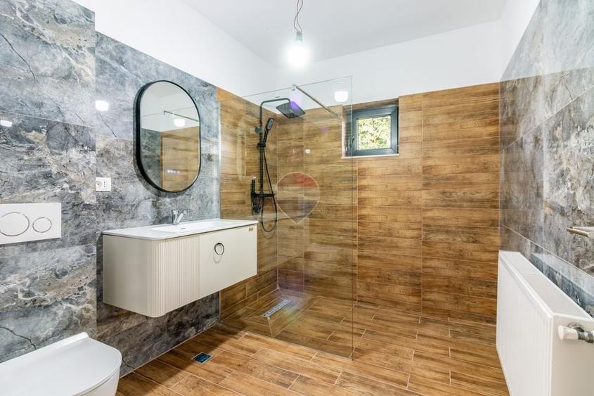 Casă individuală cu 4 camere cu Teren 1495 Mp în Bolintin-Deal