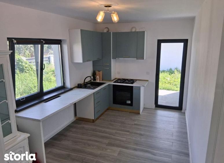 Casă cu 4 camere cu Teren 466 Mp în Holboca