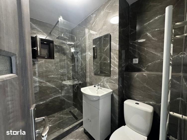 Apartament cu 4 camere decomandat în Prundu